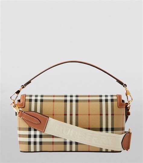 burberry fragrance travel bag|Burberry check and leather bag.